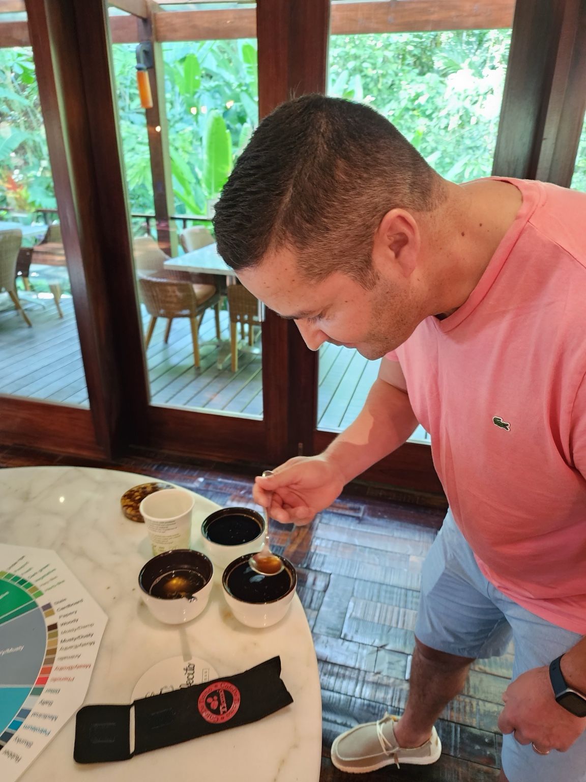 A coffee instructor demonstrating a pour-over method during a class at Nayara