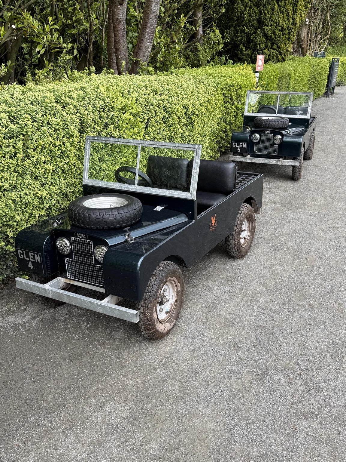 Two quarter-scale Land Rover replicas used for children's off-road driving at Gleneagles