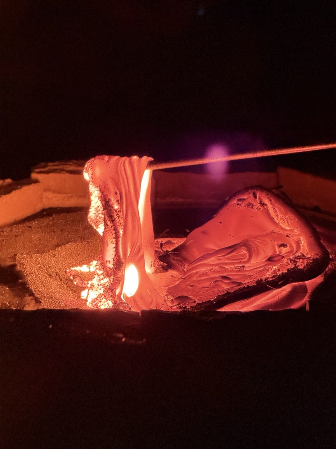 Glowing molten lava flowing during the Lava Show in Reykjavík