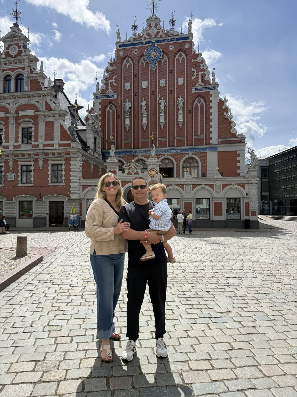 Our family outside the House of the Black Heads in Riga