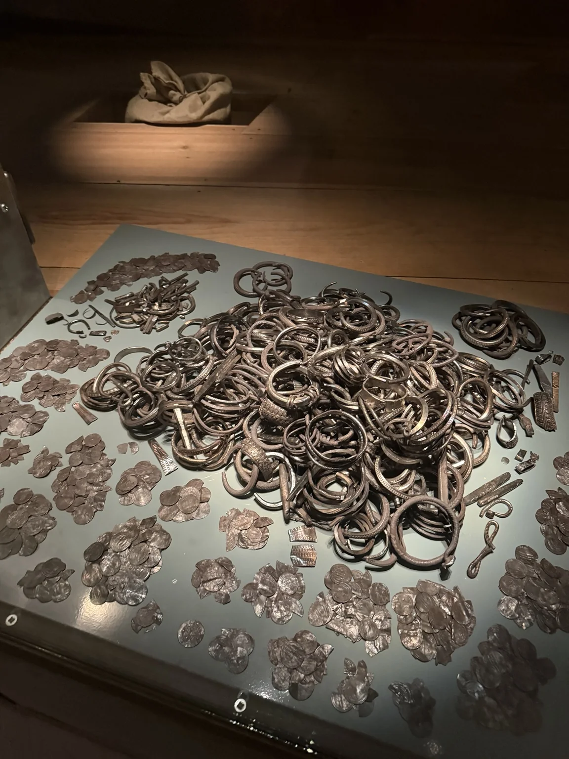Silver coins and arm rings displayed in the Treasury at Gotlands Museum
