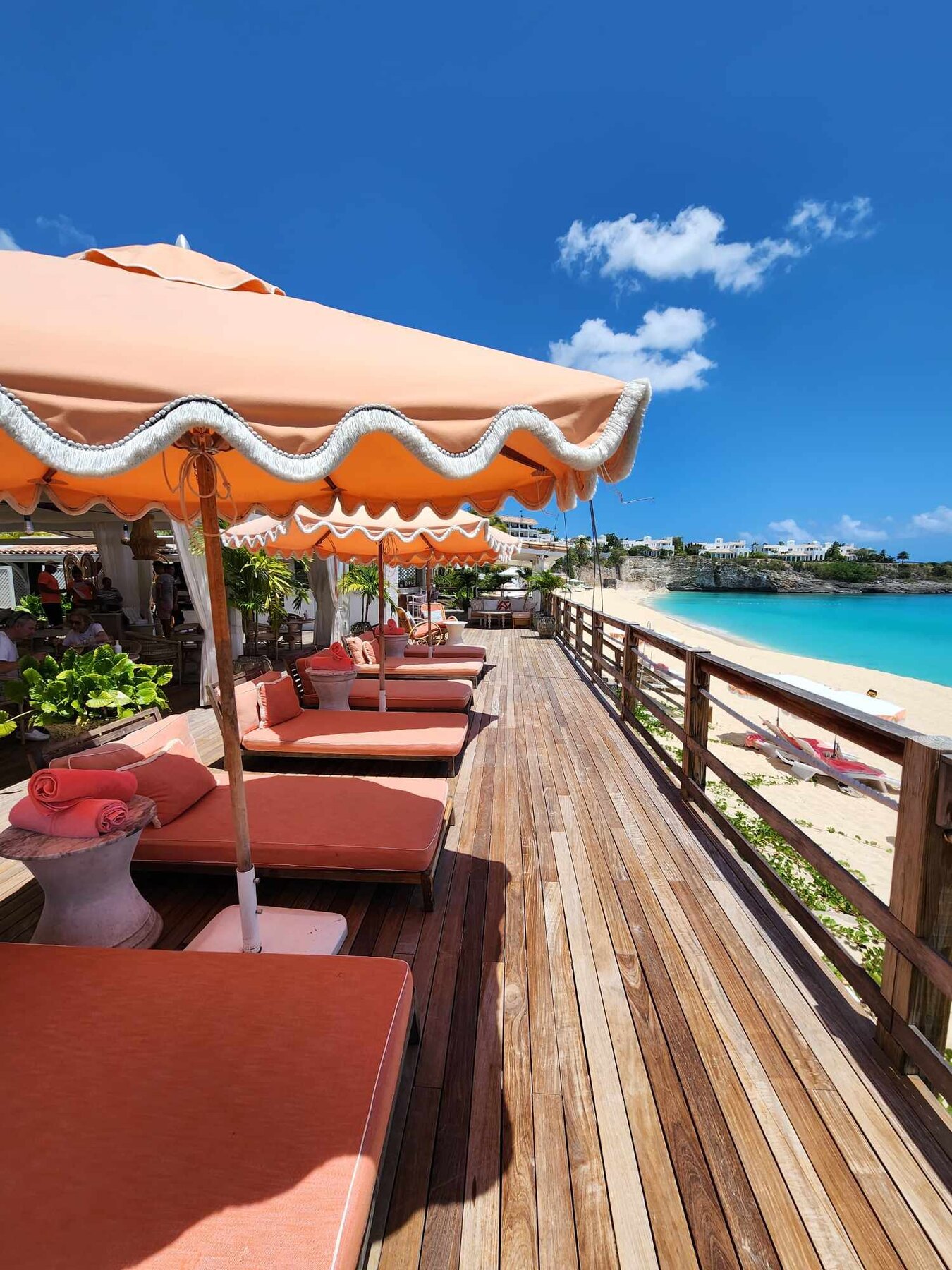 Pink umbrellas overlooking the beach at La Samanna in Saint Martin