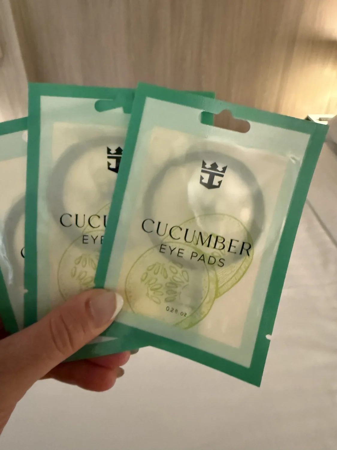 Packets of Royal Caribbean cucumber eye pads delivered to our suite